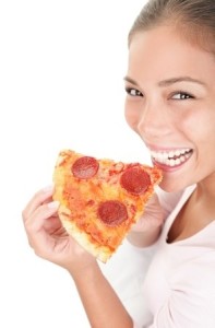 Woman eating pizza