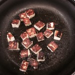 Cheese cubes in pan after
