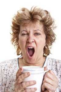 Woman yawning dishevled